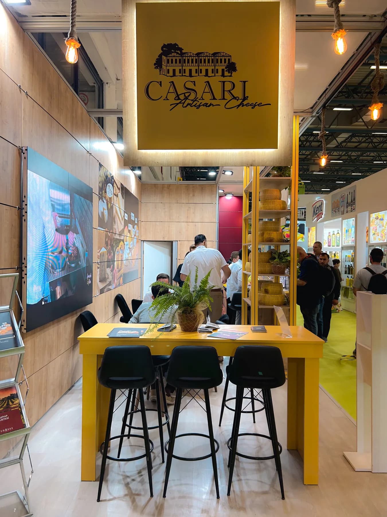 Casari Cheese — Natural materials and a welcoming tasting counter.