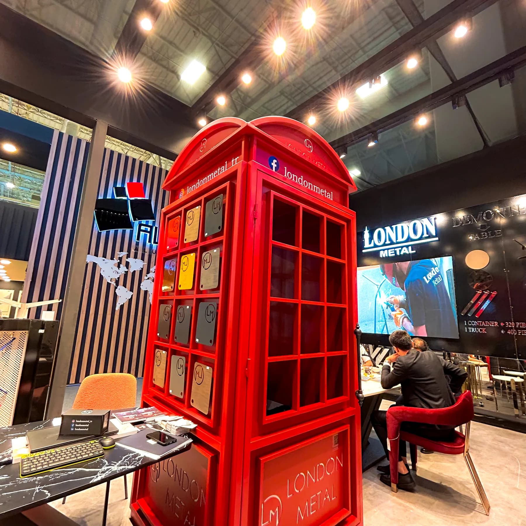 London Metal — A red telephone box as the focal point of the display.