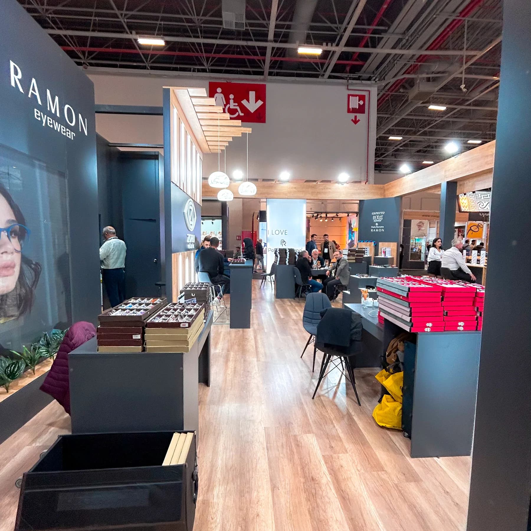 Zorlu Optik — Wooden beams connect product displays and meeting areas.