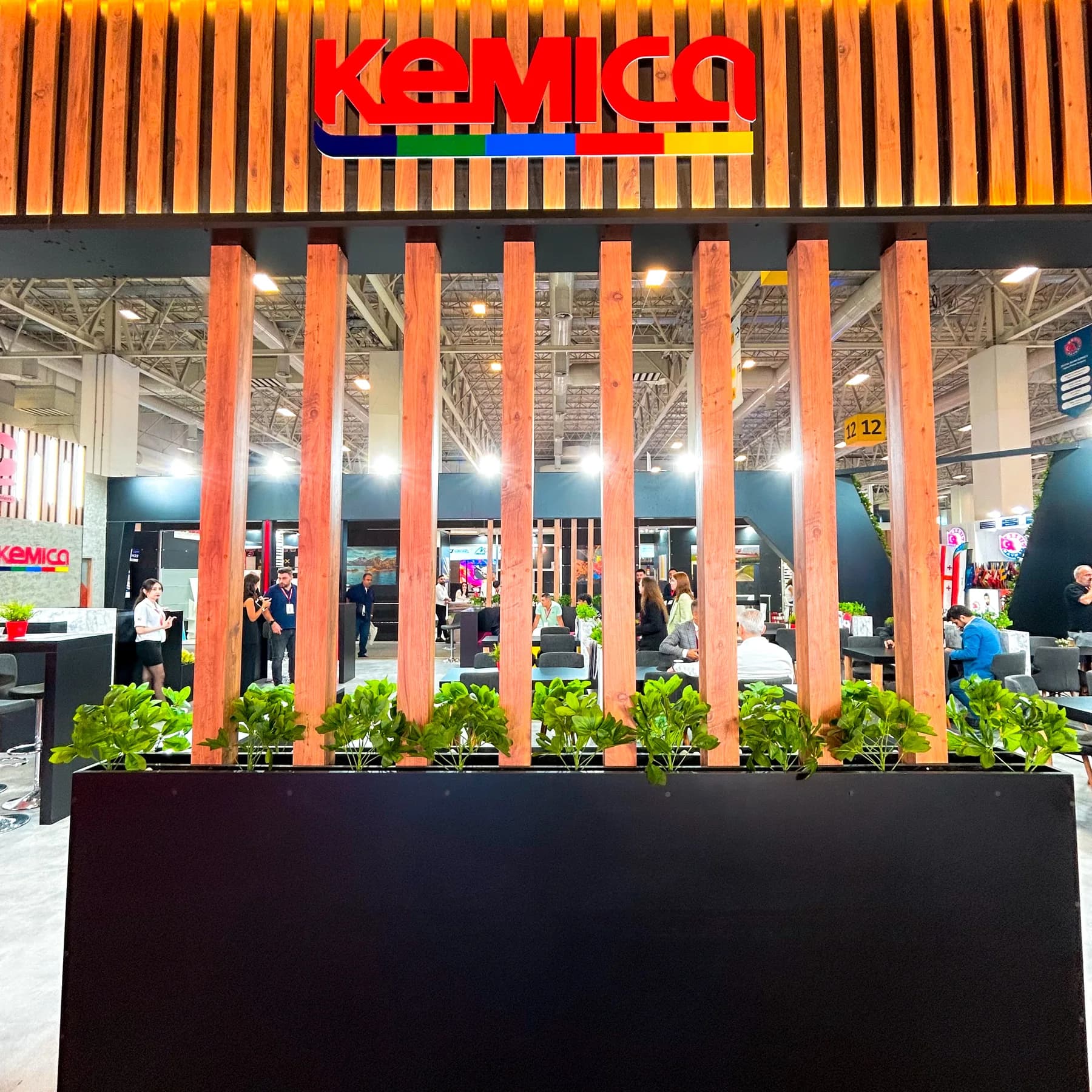 Wood details and meeting area at the Taç Reklam stand