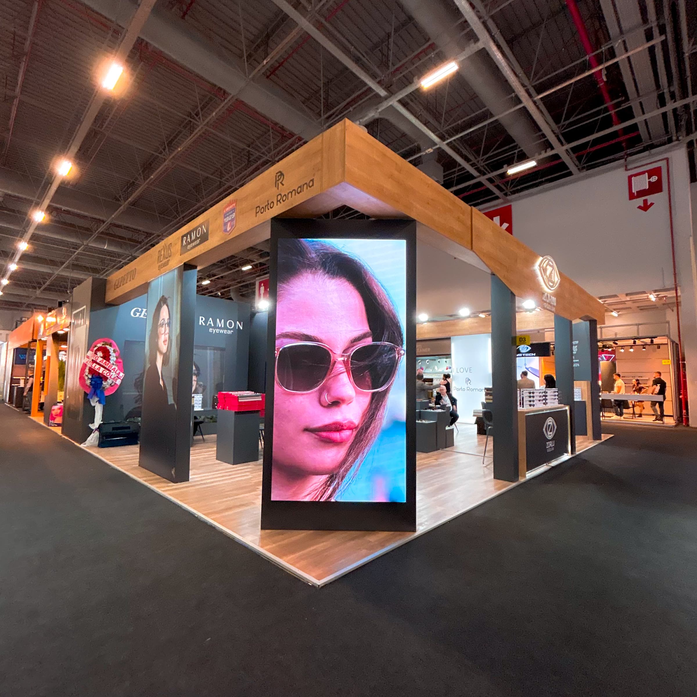 Wood-beam custom exhibition stand with an integrated LED screen